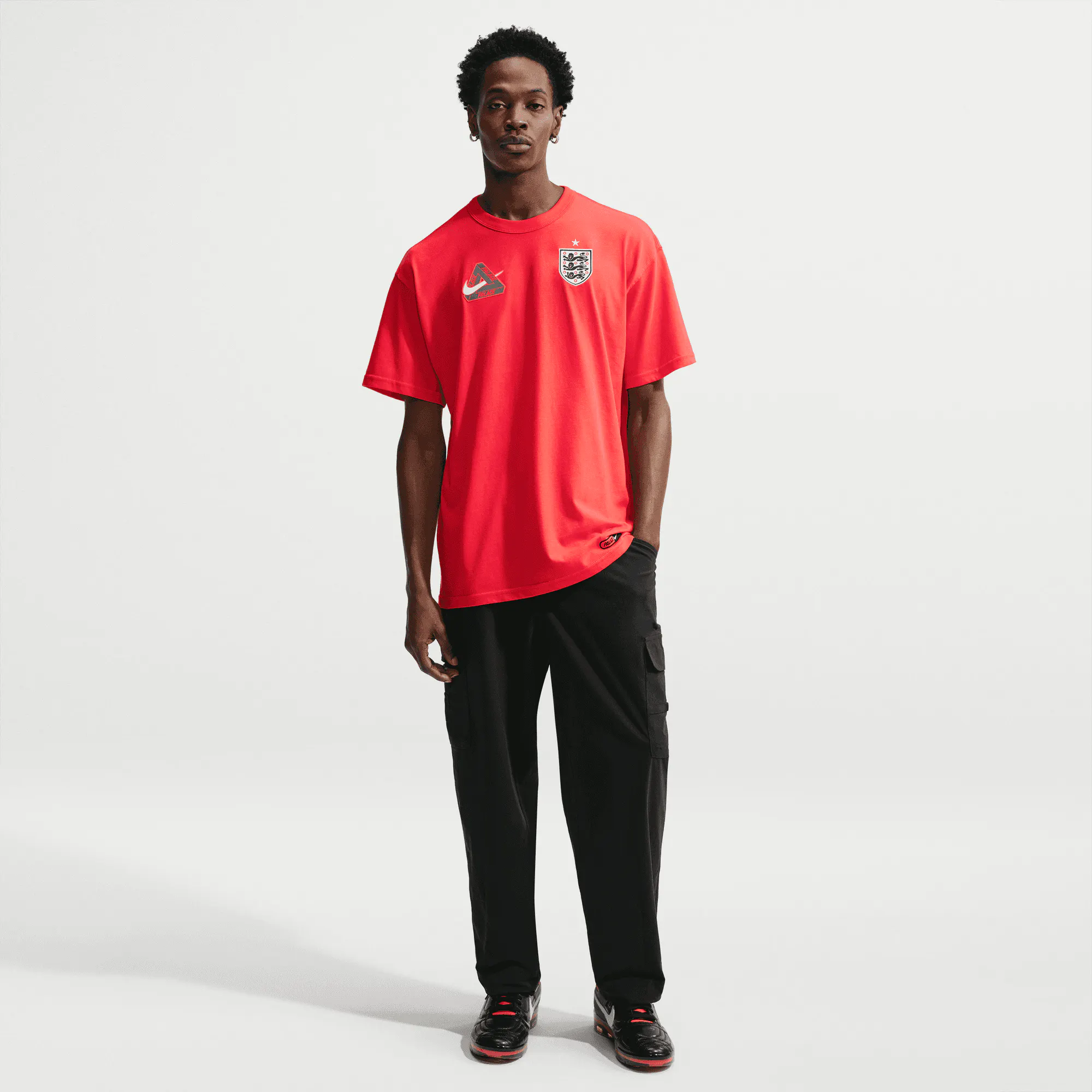 Image of Nike - Palace England T-Shirt - (Light Crimson)