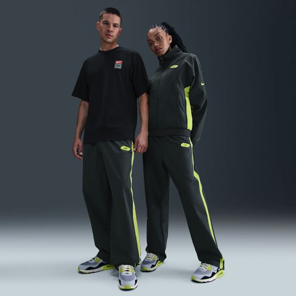 Hero image for Nike x Patta Track Pants 'Black/Cyber'