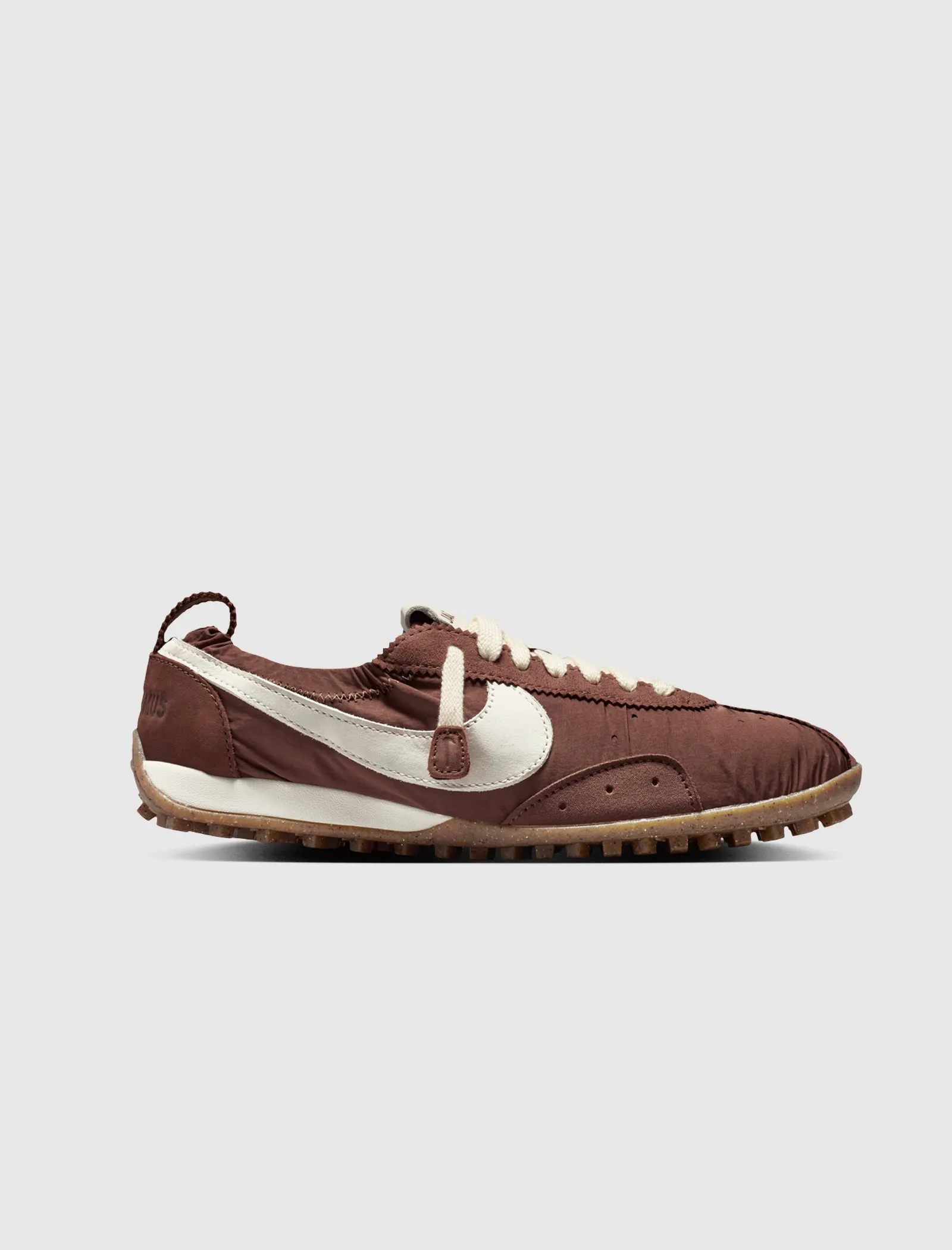 Hero image for JACQUEMUS X NIKE MOON SHOE "FAUNA BROWN/CASHMERE"