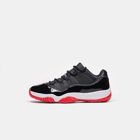 Hero image for Air Jordan 11 Retro Low Sneaker in Black/Varsity Red/White