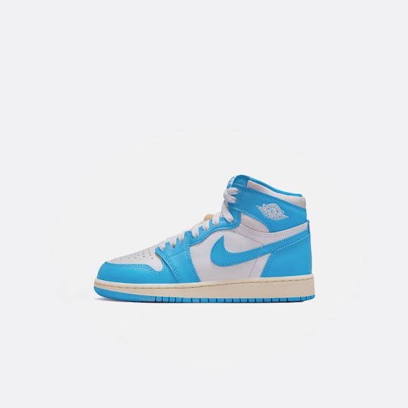 Hero image for Air Jordan 1 Retro High OG Grade School Sneaker in Dark Powder Blue/Sail