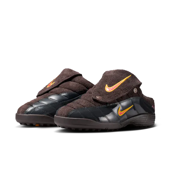 Hero image for Nike × Kids of Immigrants T-90 Mule "Velvet Brown/University Gold."