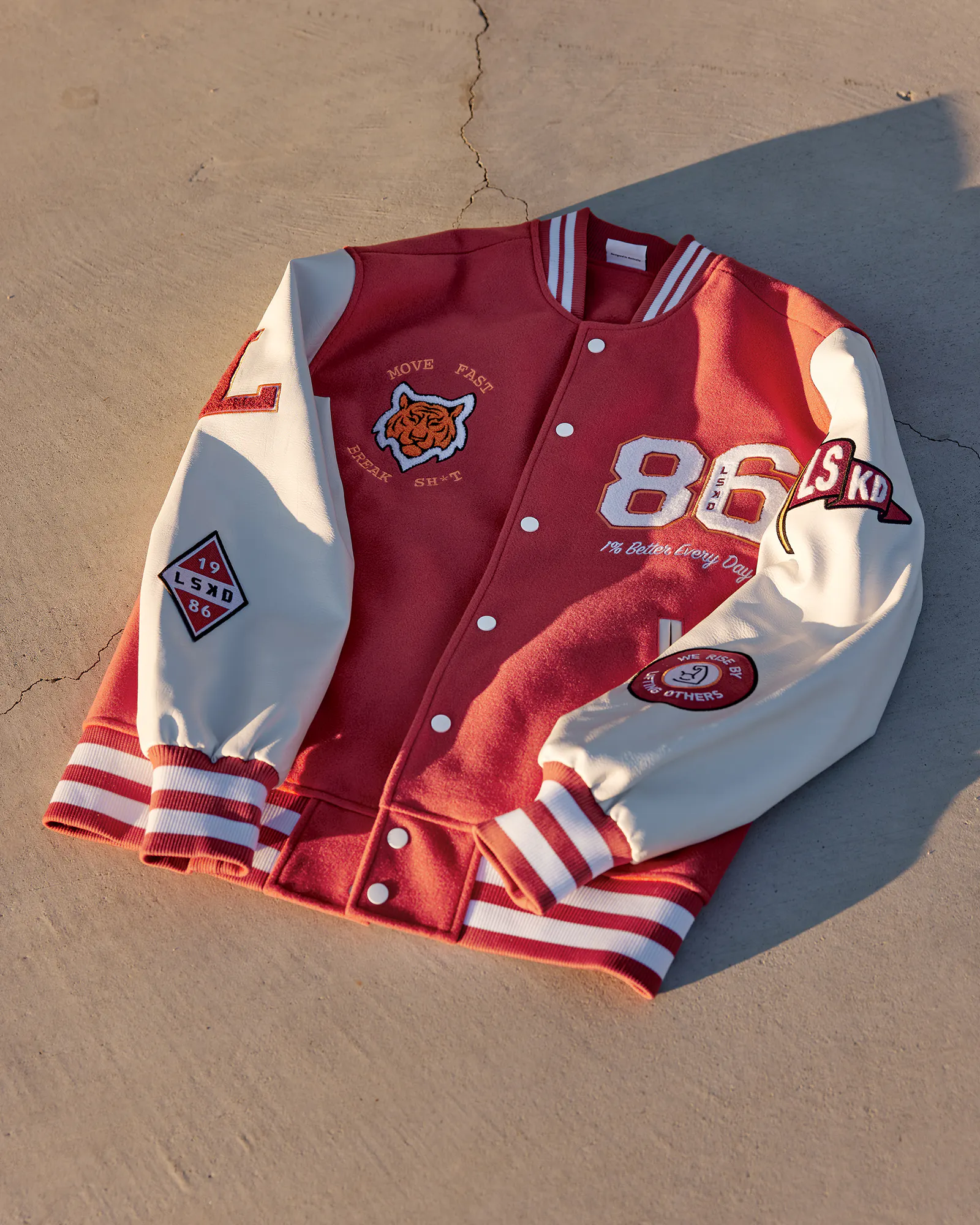 Hero image for Unisex Varsity Bomber Jacket - Mineral Red